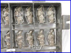 123/238 ANTIQUE CHOCOLATE/CANDY MOLD 23 RABBITS With BASKET RABBIT 4.5x2x1