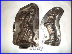 2 antique Anton Reiche Chocolate Molds Hinged clips Father Christmas Bunny baske