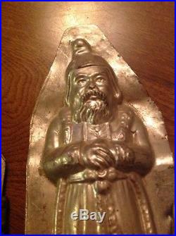 A Pair Of Anton Reiche Antique Chocolate mold Santa/ Father Christmas