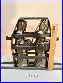 ANTIQUE METAL CHOCOLATE MOLD TWO BUNNIES 13 TALL by 4 WIDE by 2 THICK ANTIQUE METAL CHOCOLATE MOLD TWO BUNNIES 13 TALL by 4 WIDE by 2 THICK
