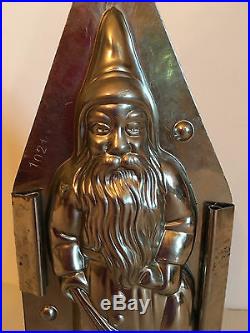 ANTIQUE VINTAGE SANTA WITH BAG & SWITCH CHOCOLATE MOLD. 8 1/2 tall. GERMANY