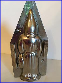 ANTIQUE VINTAGE SANTA WITH BAG & SWITCH CHOCOLATE MOLD. 8 1/2 tall. GERMANY