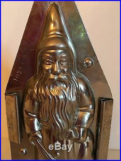 ANTIQUE VINTAGE SANTA WITH BAG & SWITCH CHOCOLATE MOLD. 8 1/2 tall. GERMANY