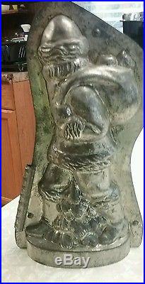 Antique 13 inch tin chocolate santa mold made in Germany l think by Anton reiche