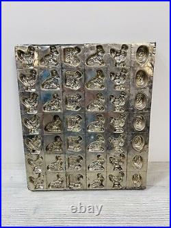 Antique Chocolate Mold with 42 Molds of Bunnies Hens Chickens Eggs and Bunnies