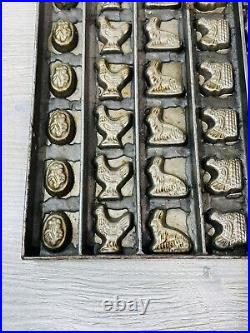 Antique Chocolate Mold with 42 Molds of Bunnies Hens Chickens Eggs and Bunnies