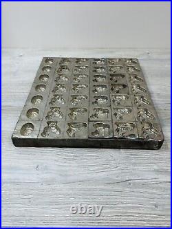 Antique Chocolate Mold with 42 Molds of Bunnies Hens Chickens Eggs and Bunnies