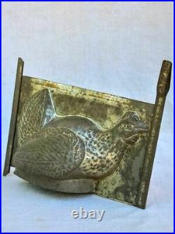Antique French tin plate chocolate mold in the shape of a chicken