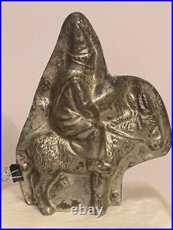 Antique Santa on a Donkey repousse Chocolate Mold pre-owned
