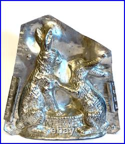 Antique Vntage Chocolate Mold. Two Rabbits Holding Paws Over A Basket Antique Vntage Chocolate Mold. Two Rabbits Holding Paws Over A Basket