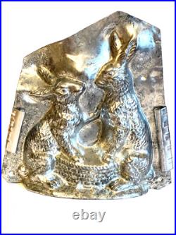 Antique Vntage Chocolate Mold. Two Rabbits Holding Paws Over A Basket Antique Vntage Chocolate Mold. Two Rabbits Holding Paws Over A Basket