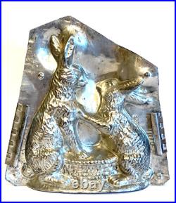 Antique Vntage Chocolate Mold. Two Rabbits Holding Paws Over A Basket Antique Vntage Chocolate Mold. Two Rabbits Holding Paws Over A Basket