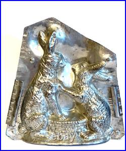 Antique Vntage Chocolate Mold. Two Rabbits Holding Paws Over A Basket Antique Vntage Chocolate Mold. Two Rabbits Holding Paws Over A Basket