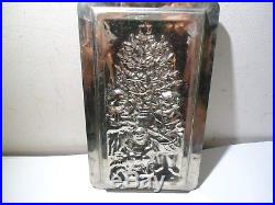 Antique chocolate Christmas mold Anton Reiche children posing in front of tree