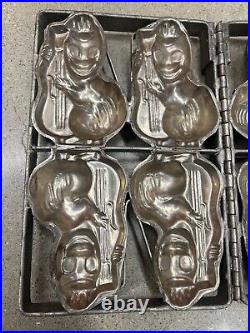 Antique metal chocolate strap cage mold 4 animals playing a bass fiddle or cello