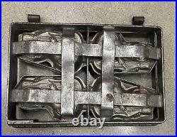 Antique metal chocolate strap cage mold 4 animals playing a bass fiddle or cello