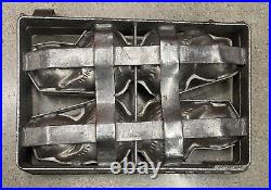 Antique metal chocolate strap cage mold 4 animals playing a bass fiddle or cello