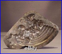 Anton Reiche Antique Chocolate Mold Santa and Angel on shooting star