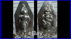 Original Antique Metal Chocolate Mold French Santa with hand in satchel