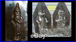 Original Antique Metal Chocolate Mold French Santa with hand in satchel