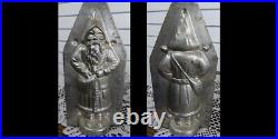 Original Antique Metal Chocolate Mold Larger French Santa with hand in satchel