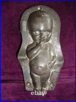 Super antique baby chocolate mold with reg mark