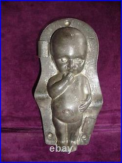 Super antique baby chocolate mold with reg mark