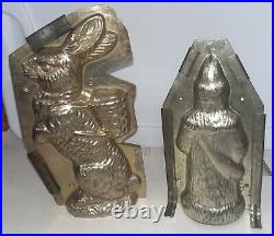 Two vintage antique metal chocolate molds Easter Bunny withbasket & St. Nick Santa