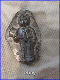 Vintage metal candy mold boy with top hat